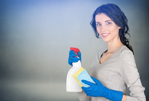 Professional cleaner working through a Maidavale home interior